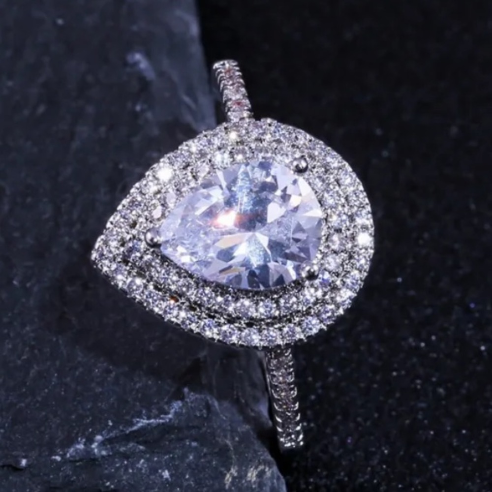 Gorgeous 3.75 ct. t.w. Pear & Round Cut Double Halo Ring - Picture 11 of 16